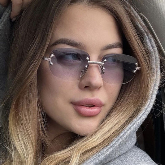Frameless cut edge oval fashionable and high-end Instagram popular sunglasses of the same style